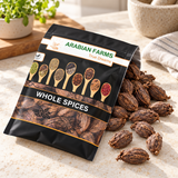Illustrative Arabian Farms Whole Black Cardamom (Bari Elaichi) pack with loose spices on a bright kitchen surface image 1